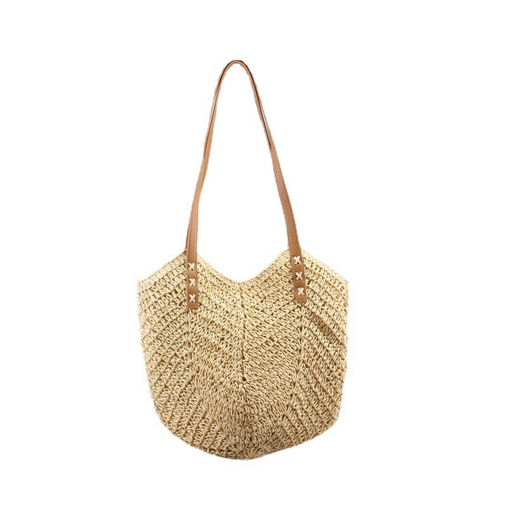 Casual bag made of handwoven straw with wide leather handles Bowlift
