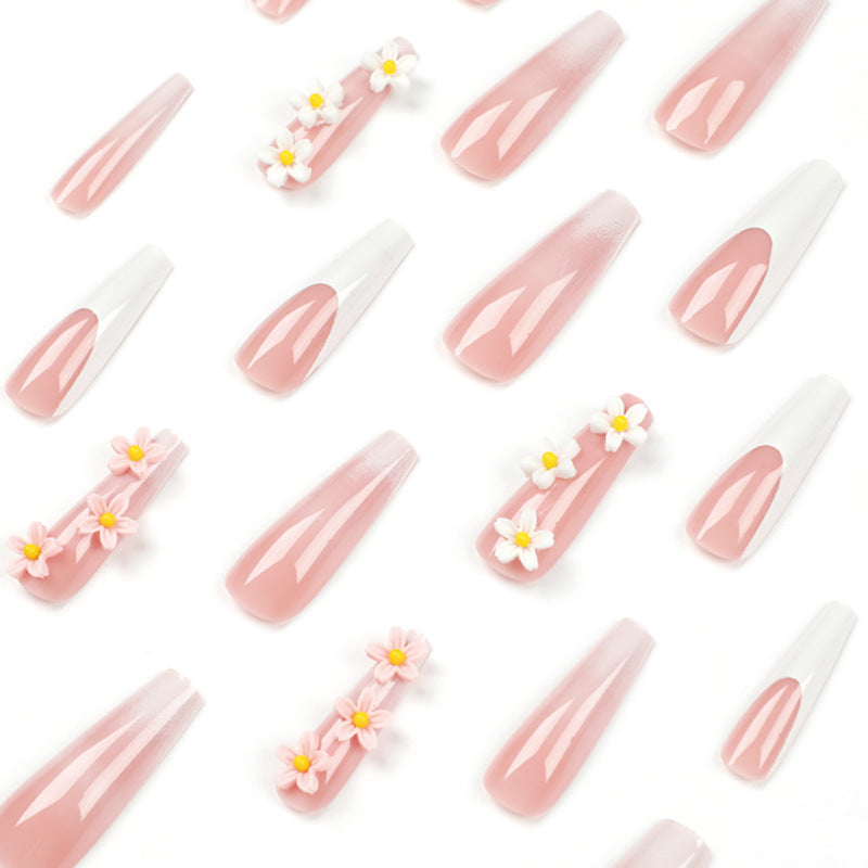 Artful nail extensions with elegant gradient and creative floral accents Bowlift