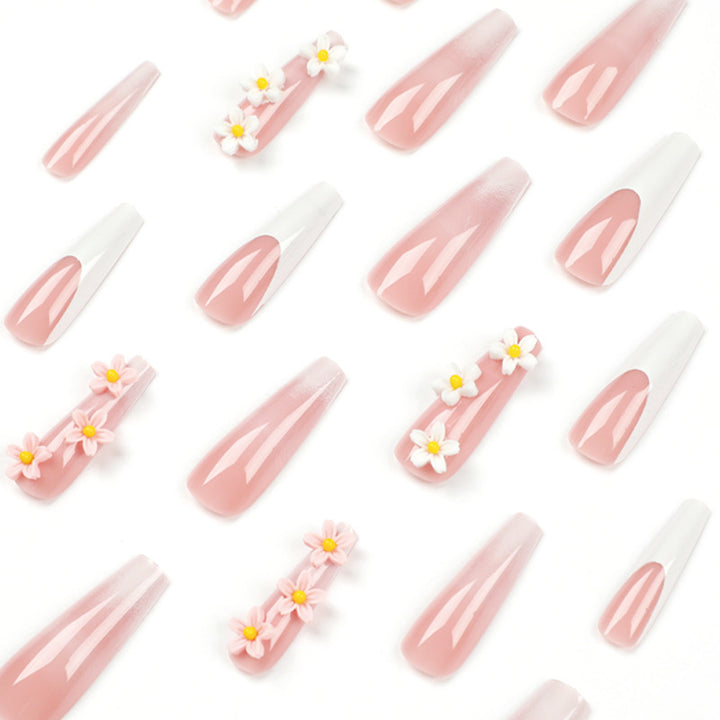 Artful nail extensions with elegant gradient and creative floral accents Bowlift