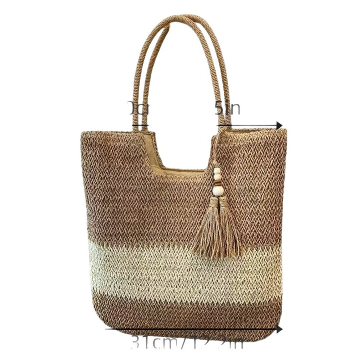 Handbag made of braided natural material with tassel details Bowlift