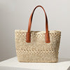 Braided straw bag with sturdy leather handles Bowlift