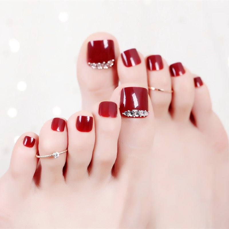 Acrylic nail set with elegant nail art and sparkle elements Bowlift