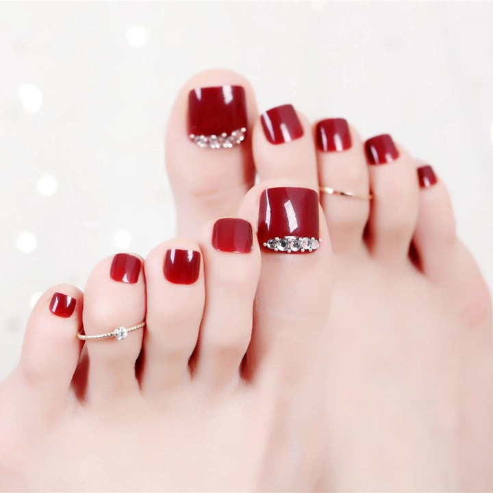 Acrylic nail set with elegant nail art and sparkle elements Bowlift