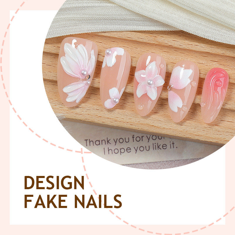 Artificial nail set with floral motifs and rhinestone decorations Bowlift