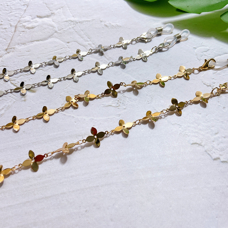Fashionable glasses holder chain with filigree flower pendants Bowlift