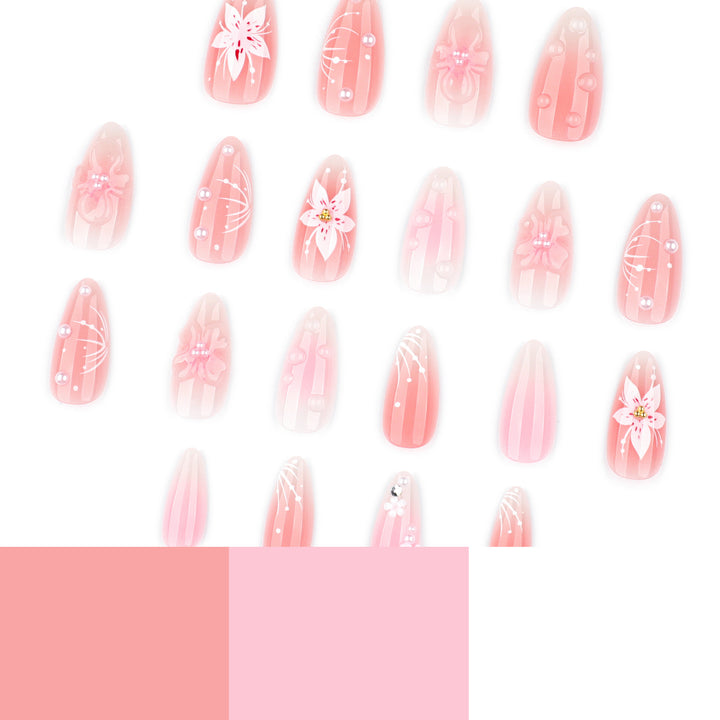 Artistic and creative nail extensions with floral accents Bowlift