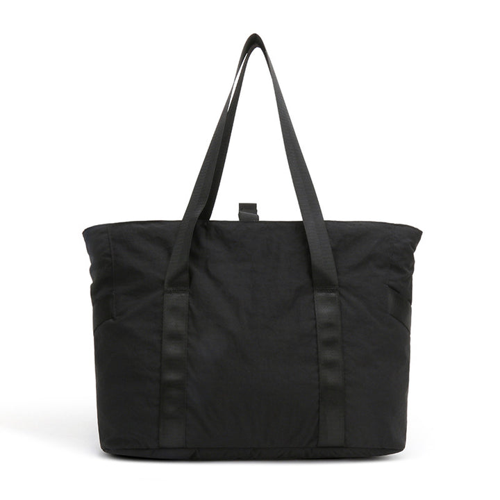 Stylish tote bag with spacious main compartment and reinforced handles Bowlift