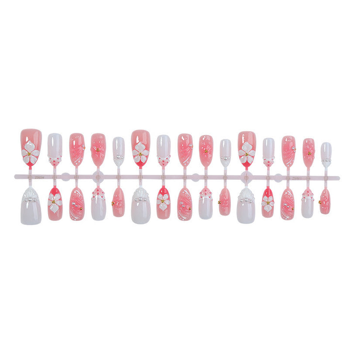 Artificial nail set with elegant floral accents Bowlift