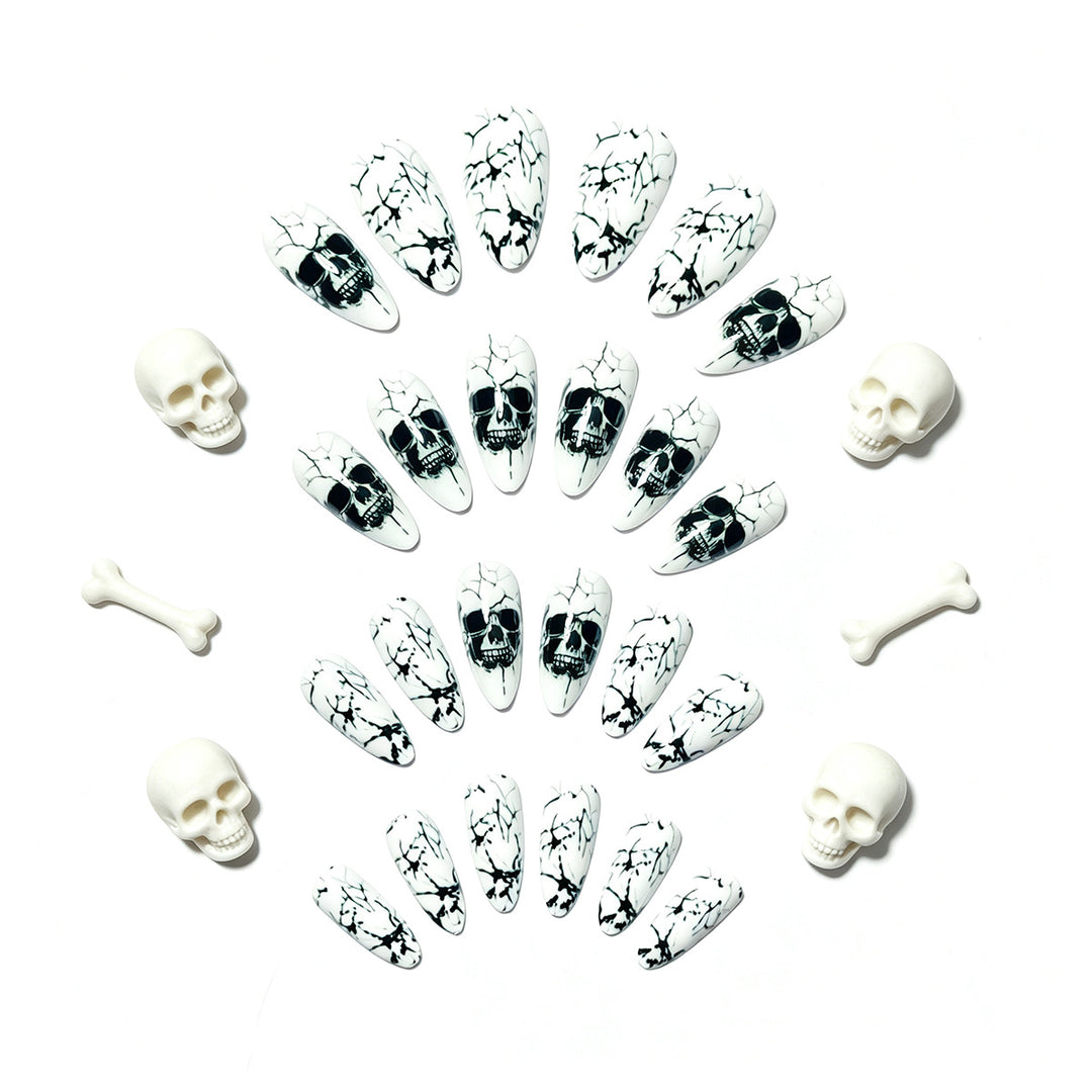 Artificial nails with playful skull design and crackle effects Bowlift