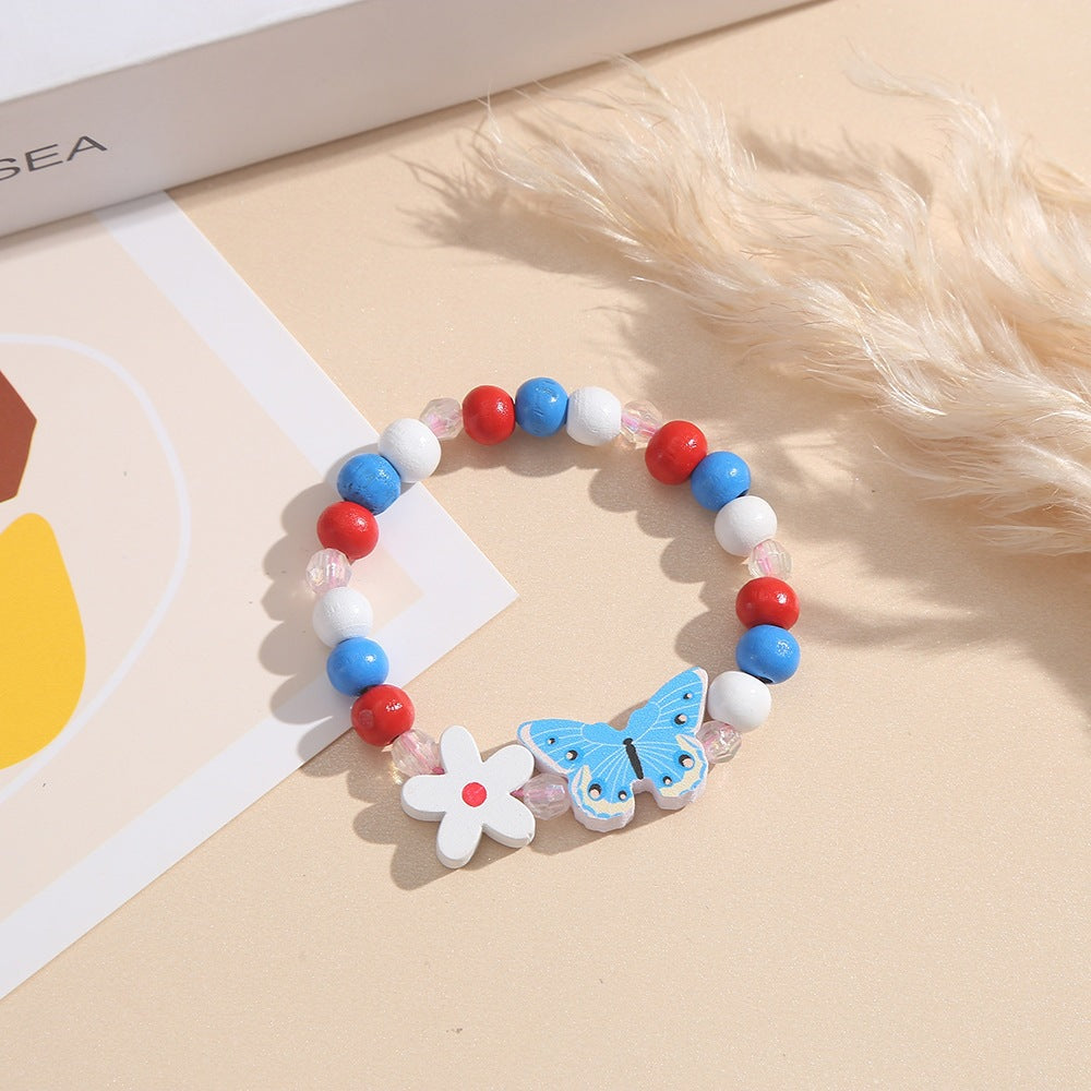 Playful bracelet with heart and butterfly charms Bowlift