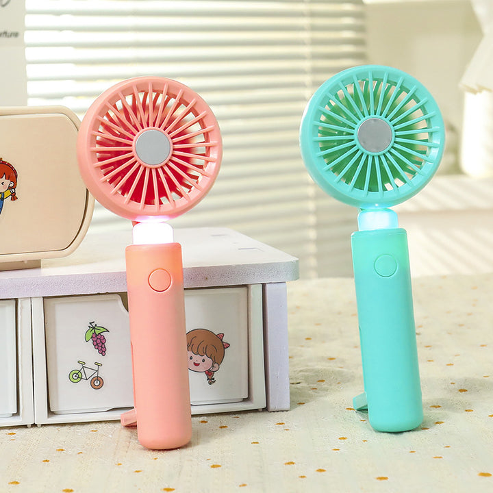 Women portable mini hand fan with integrated LED lighting and USB charging function Bowlift