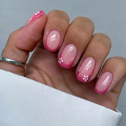 Artistic nail art with floral accent and glitter Bowlift