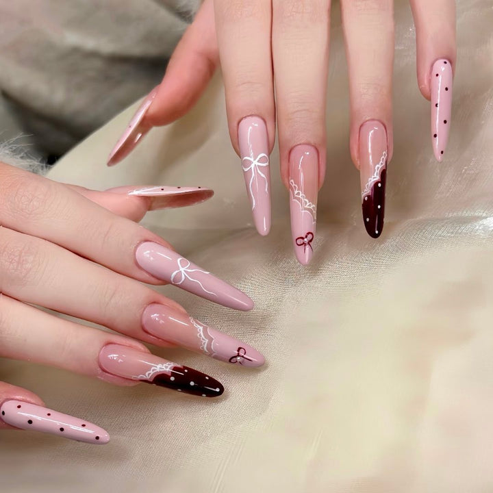 Artistic Long Stiletto Nail Enhancements Bowlift
