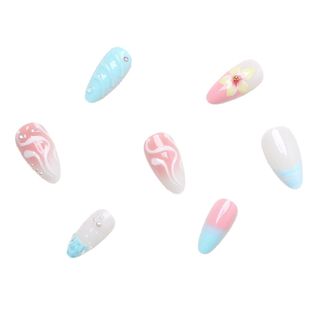 Artificial nail set with floral and shell-shaped designs Bowlift