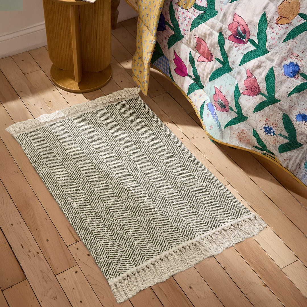 Braided runner rug with herringbone pattern and fringe edge Bowlift