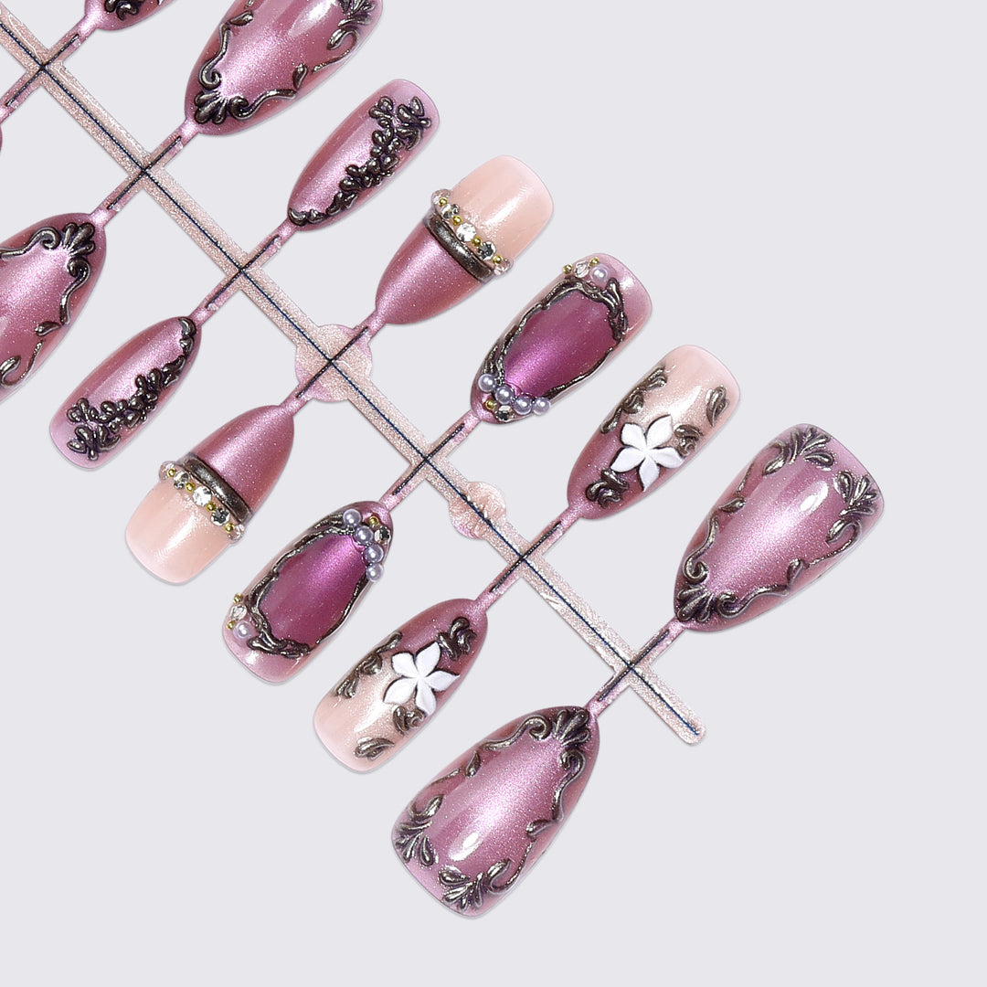 Acrylic nail set with floral design and glamorous accents Bowlift