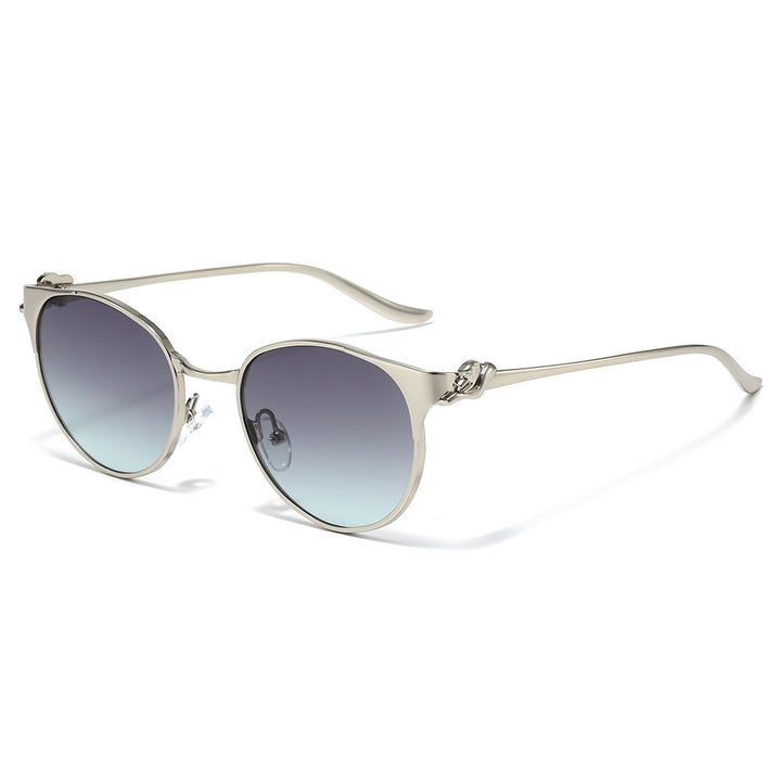 Elegant Cat-Eye Sunglasses with Decorative Gold Accents Bowlift