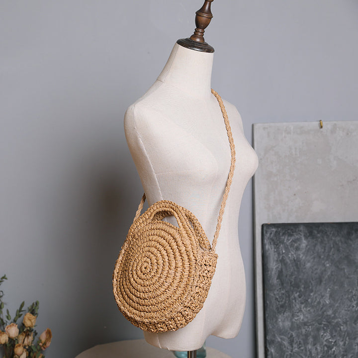 Handcrafted Round Wicker Bag with Elegant Closure Bowlift