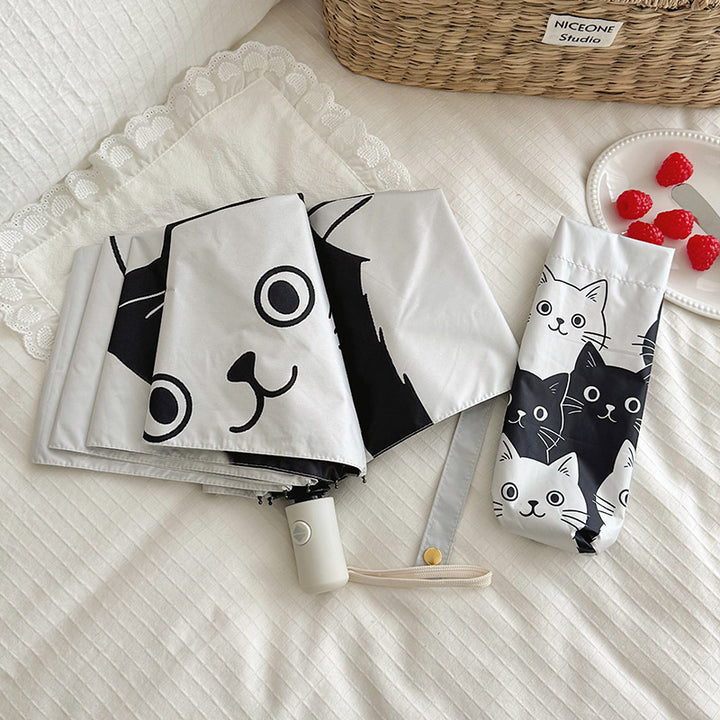 Women Folding Umbrella with Playful Cat Pattern Bowlift