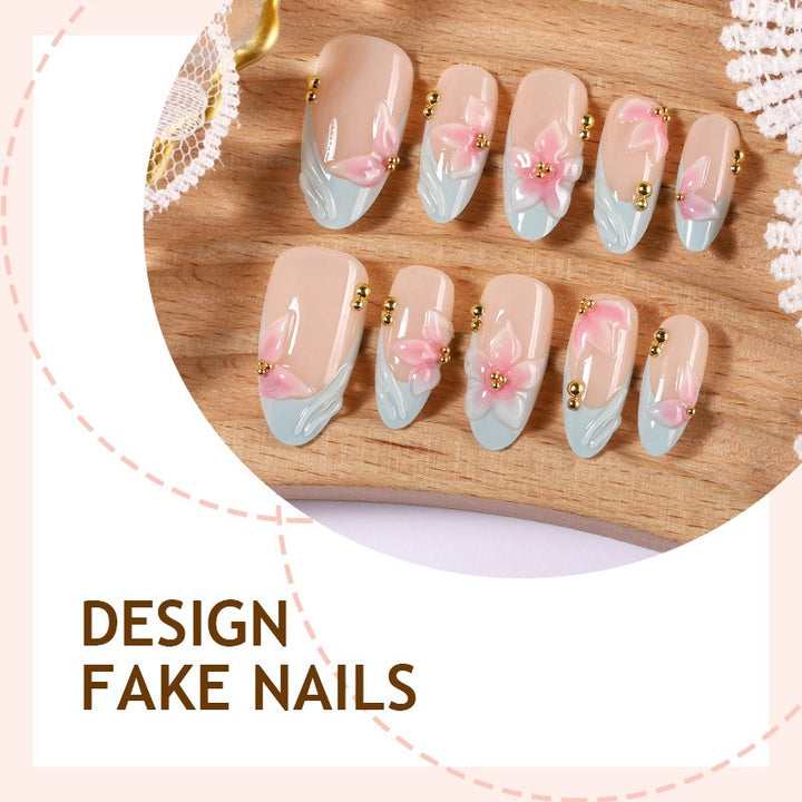 Creative nail art set with delicate flower design and glitter accents Bowlift