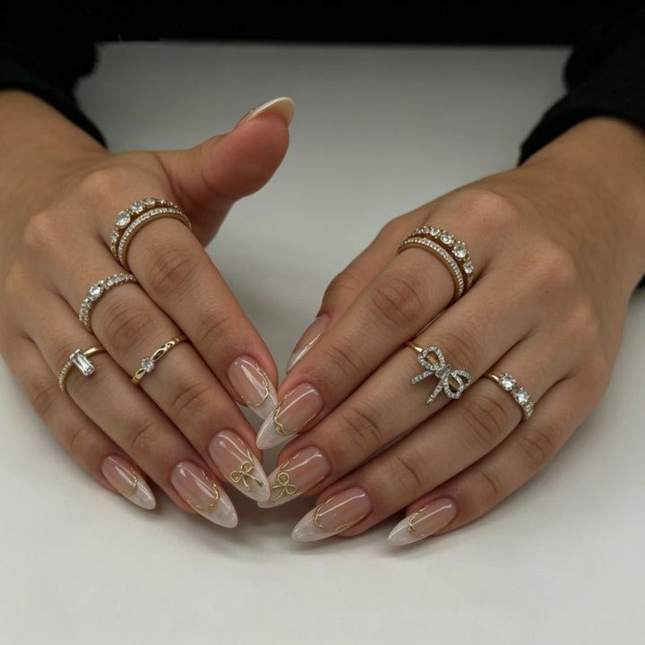 Elegant Press-On Nail Set with Gold Accents Bowlift