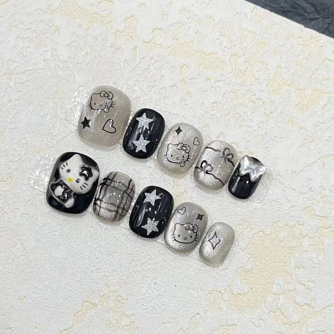 Fun and Whimsical Press-On Nail Set with Cartoon Accents Bowlift