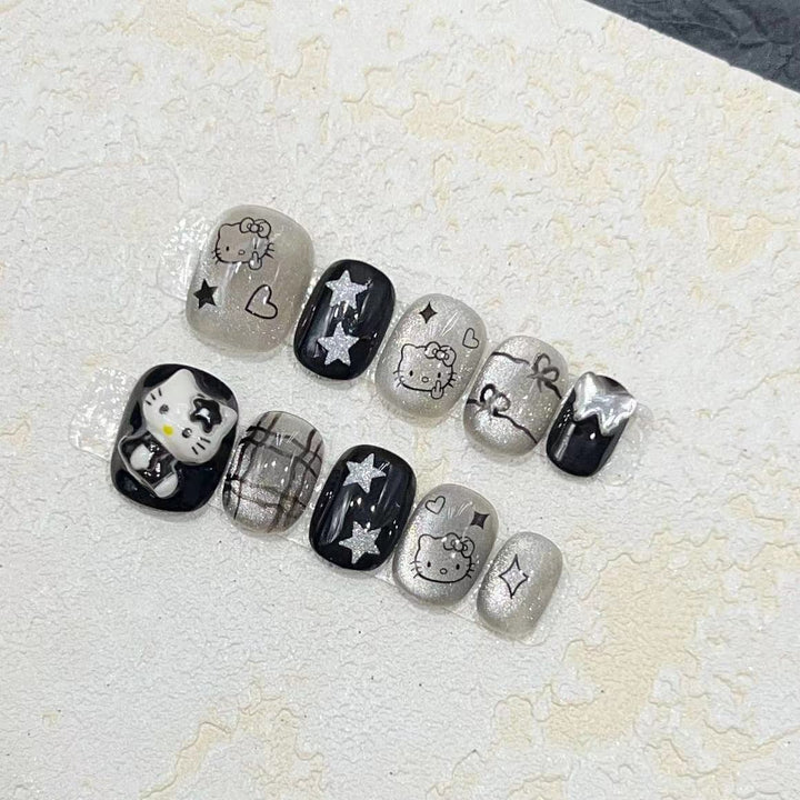 Fun and Whimsical Press-On Nail Set with Cartoon Accents Bowlift