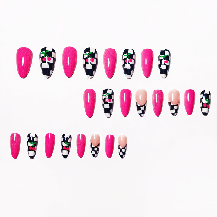 Creative artificial nails with playful cherry and checkerboard design Bowlift