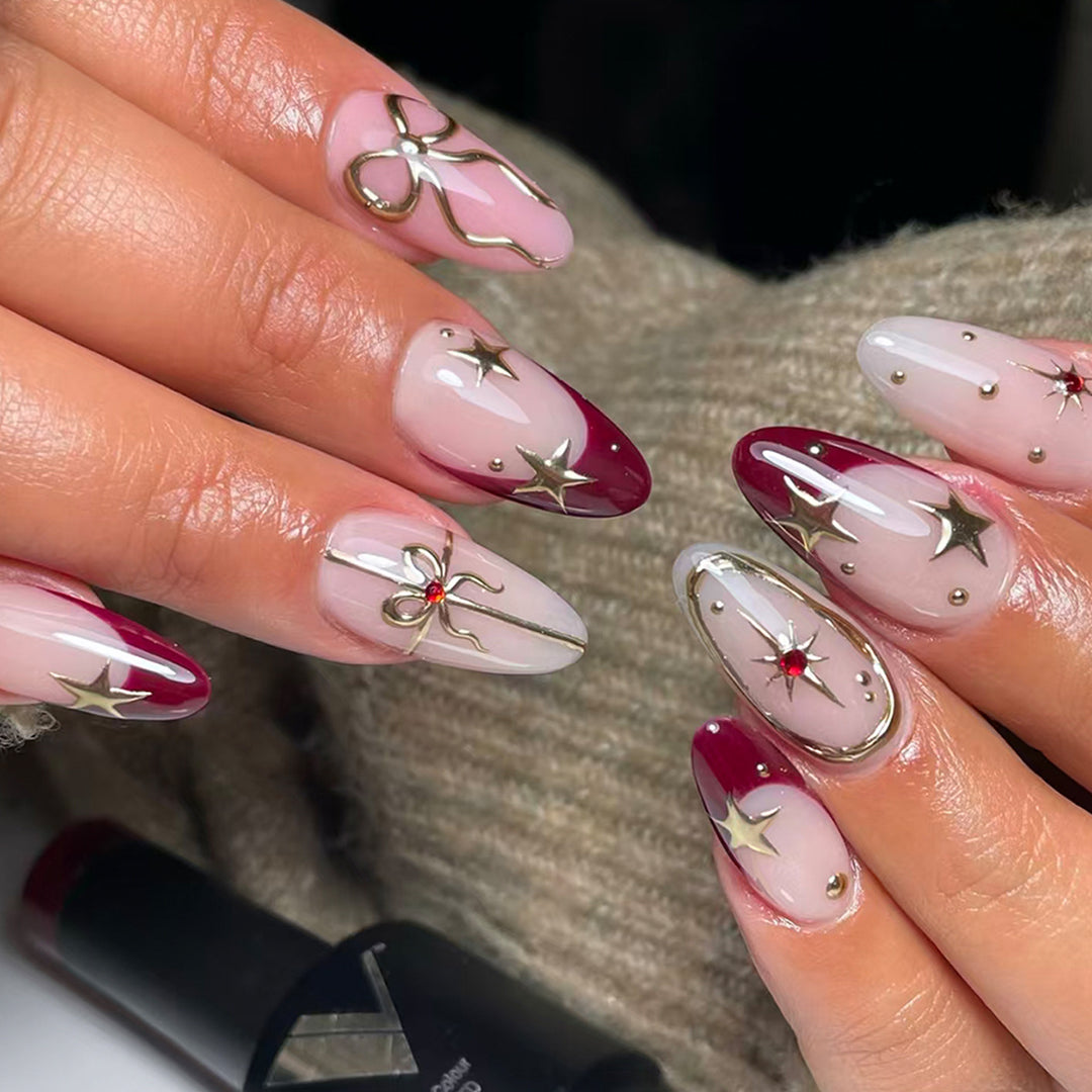 Luxury artificial fingernails with glamorous embellishments Bowlift