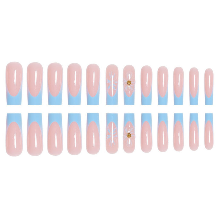 Artistic Long Press-On Nails with Floral Accents Bowlift