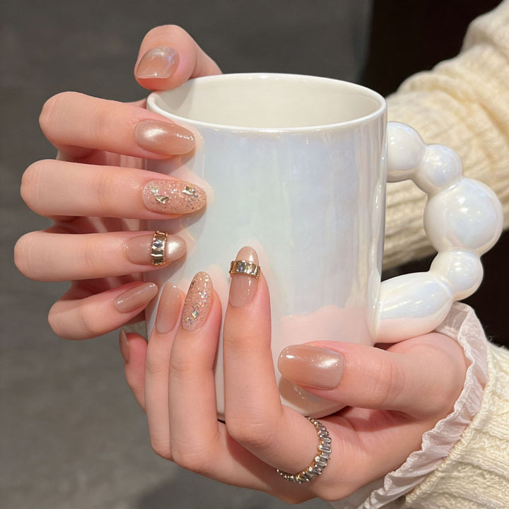 Elegant Nail Art Extensions with Pearl Accents Bowlift