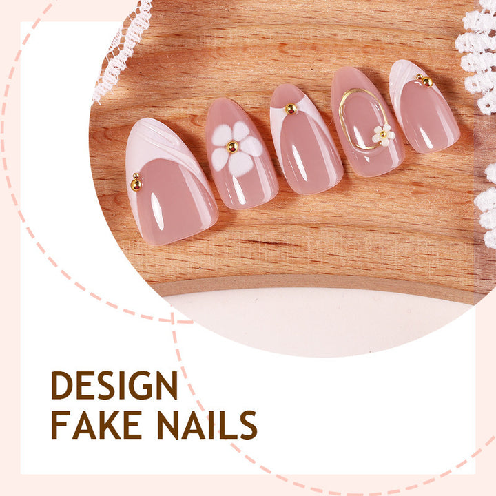 Artificial nail set with elegant flower and glitter accents Bowlift