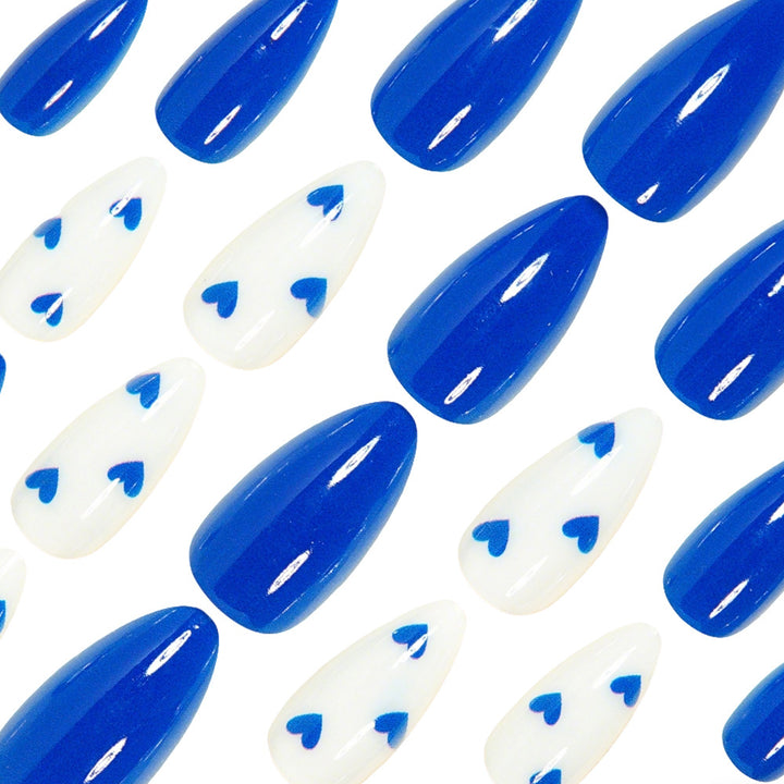 Stylish Long Stiletto Nail Art Tips with Heart Accents Bowlift