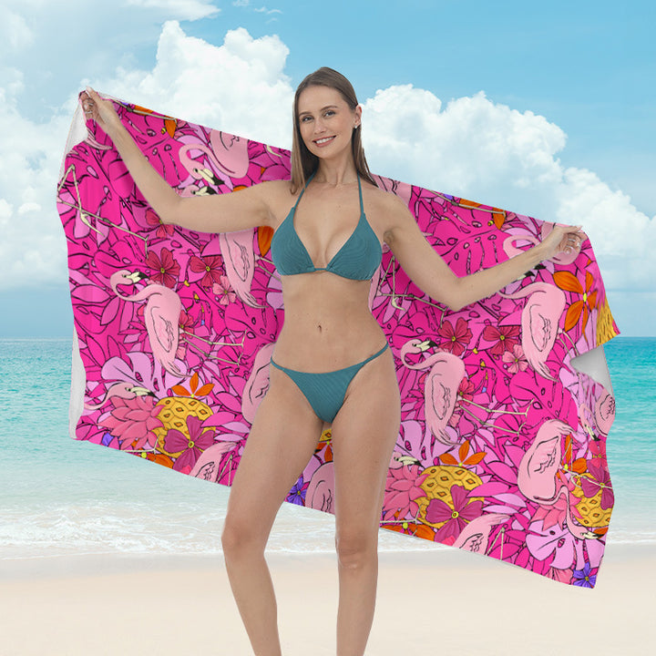 Beach towel with vibrant tropical plant motif Bowlift