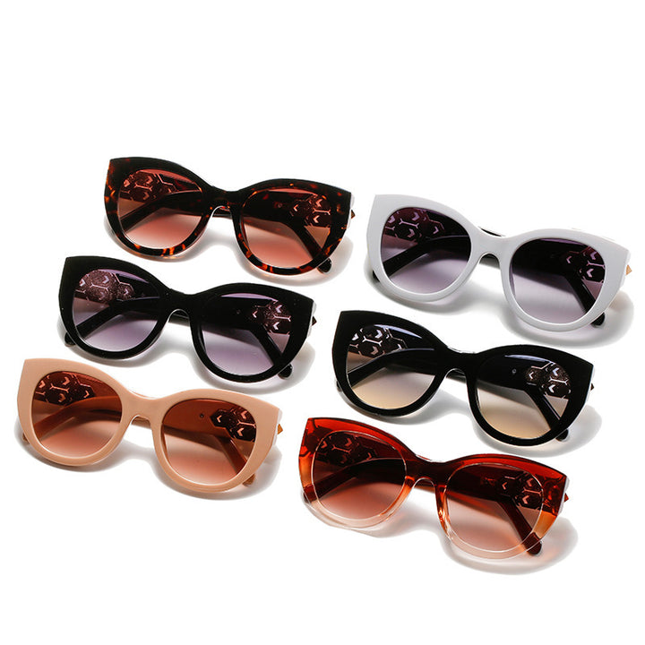 Fashion-Forward Cat-Eye Sunglasses with Decorative Accents Bowlift
