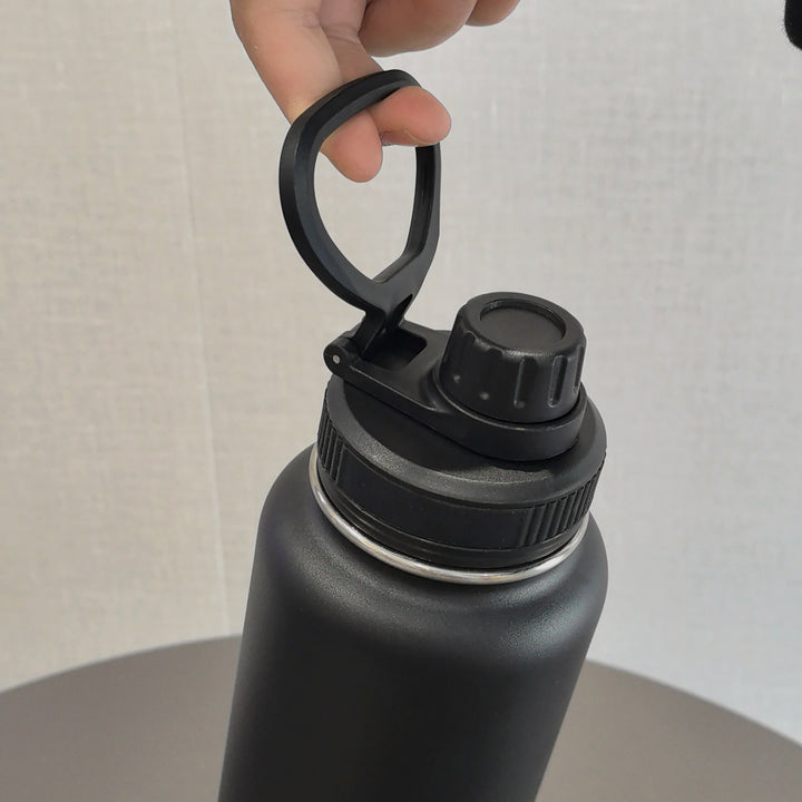 Insulated stainless steel water bottle with wide mouth and silicone carry loop Bowlift