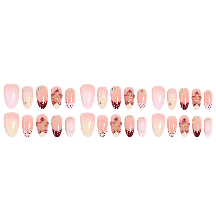 Elegant artificial nails set with floral accents Bowlift