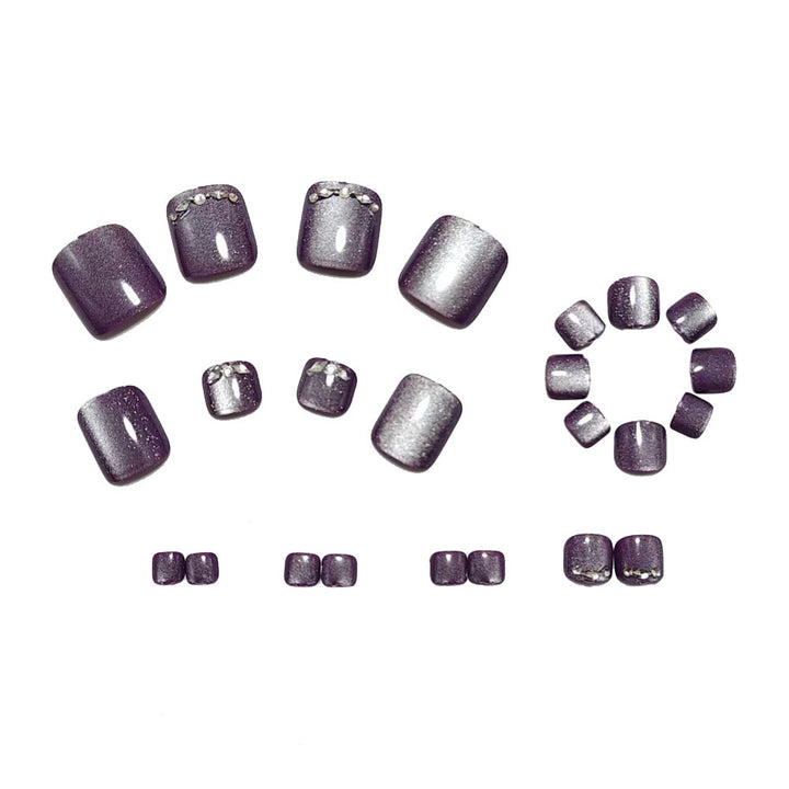 Artificial nails with glamorous rhinestone accents Bowlift