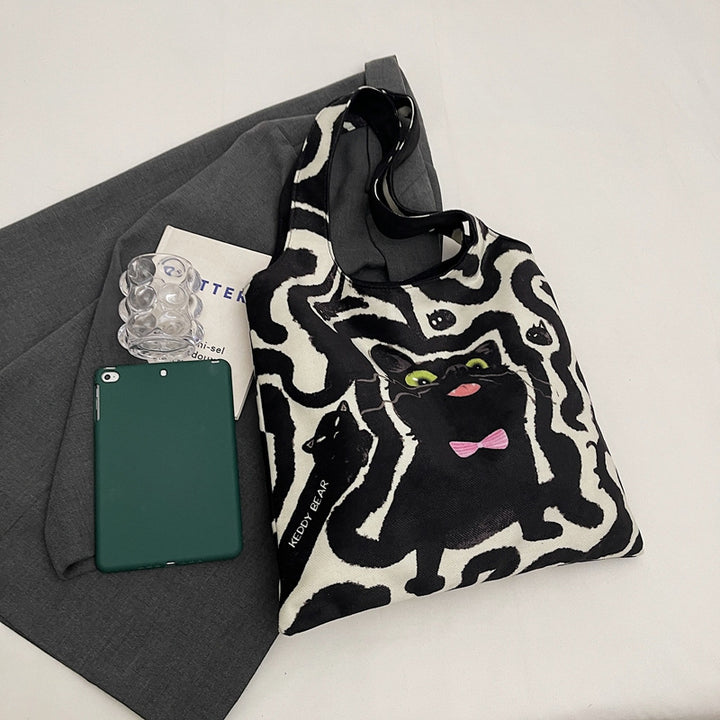 Shoulder bag with playful cat motif Bowlift
