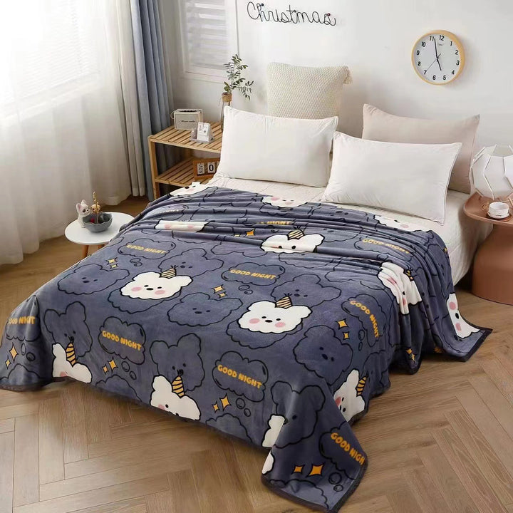 Women's cozy fleece blanket with playful cloud pattern Bowlift