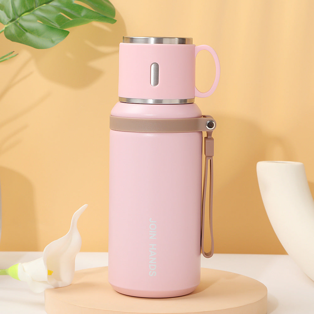 Women's insulated stainless steel drinking bottle with foldable cup Bowlift