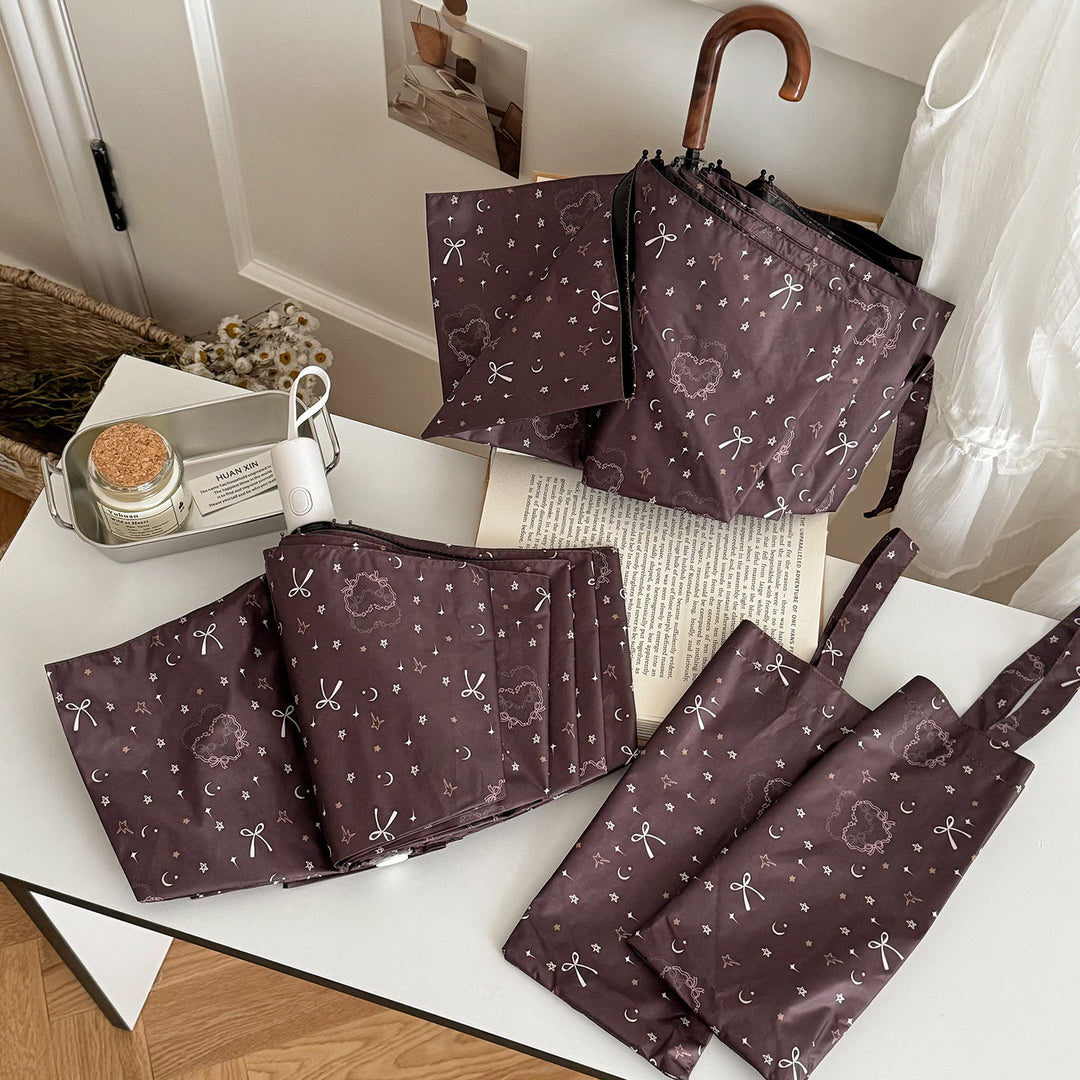 Women's folding umbrella with elegant pendant design Bowlift