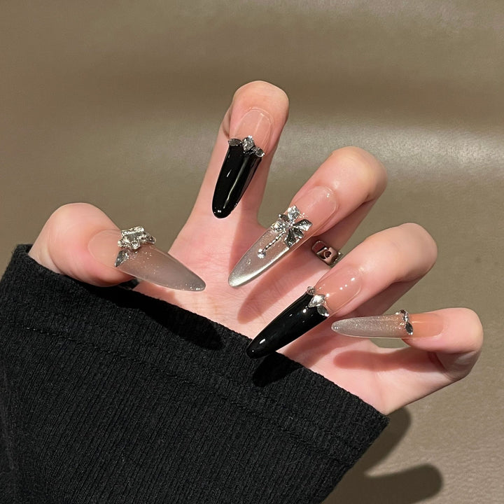 Artistic Stiletto Press-On Nail Art with Glimmering Accents Bowlift