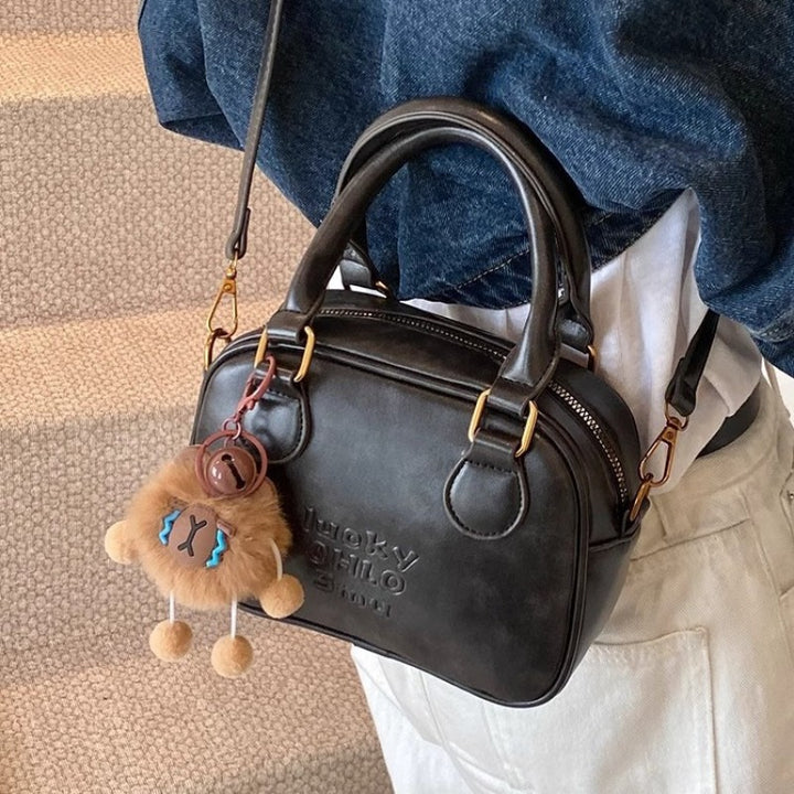 Vintage-Inspired Structured Handbag Bowlift