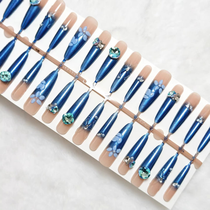 Elegant artificial nails with floral applications and glitter elements Bowlift