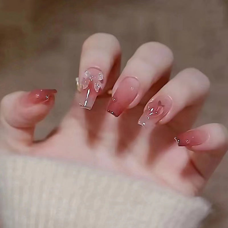 Elegant Long Press-On Nails with Floral Accents Bowlift