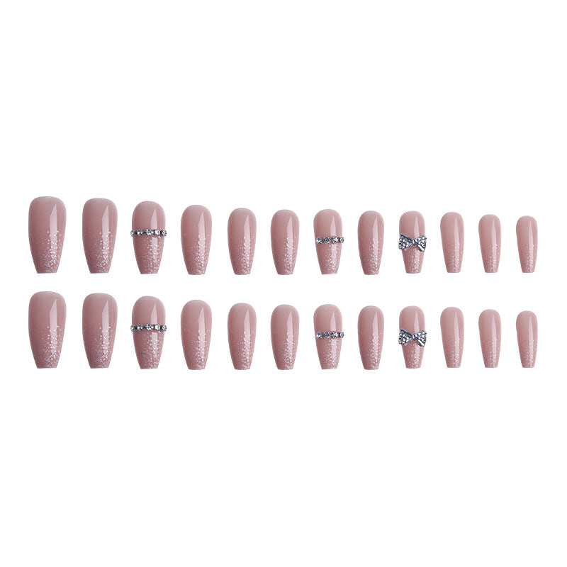 Glamorous artificial nails with sparkling rhinestone and glitter elements Bowlift