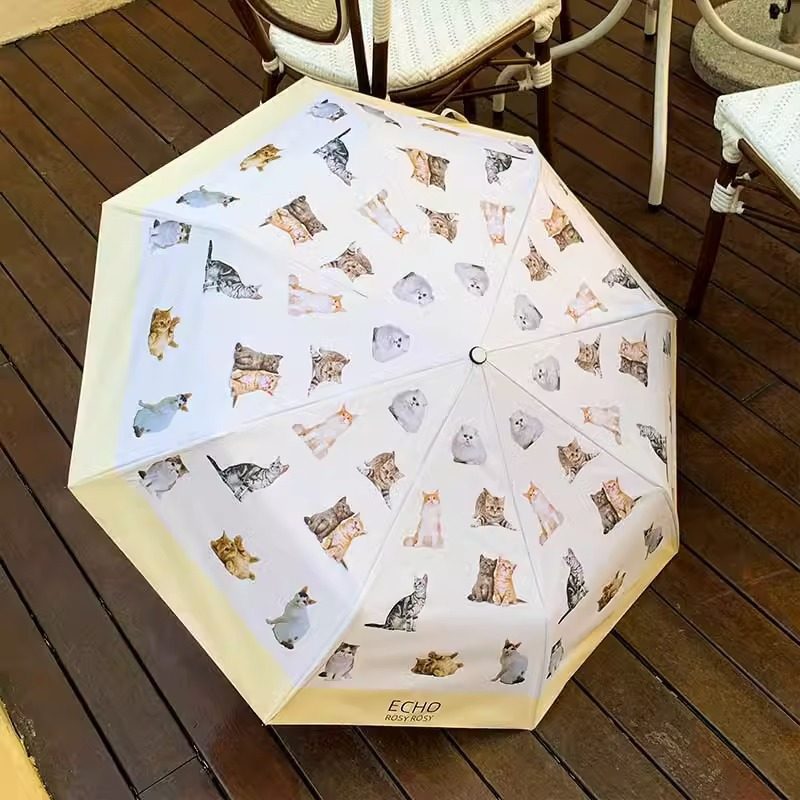 Ladies folding umbrella with playful animal design Bowlift