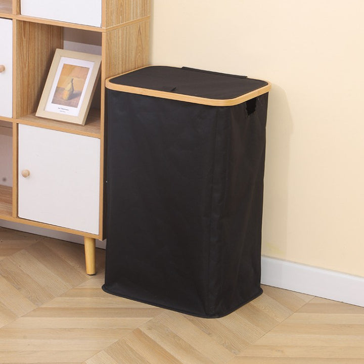 Stylish laundry basket with wooden lid Bowlift
