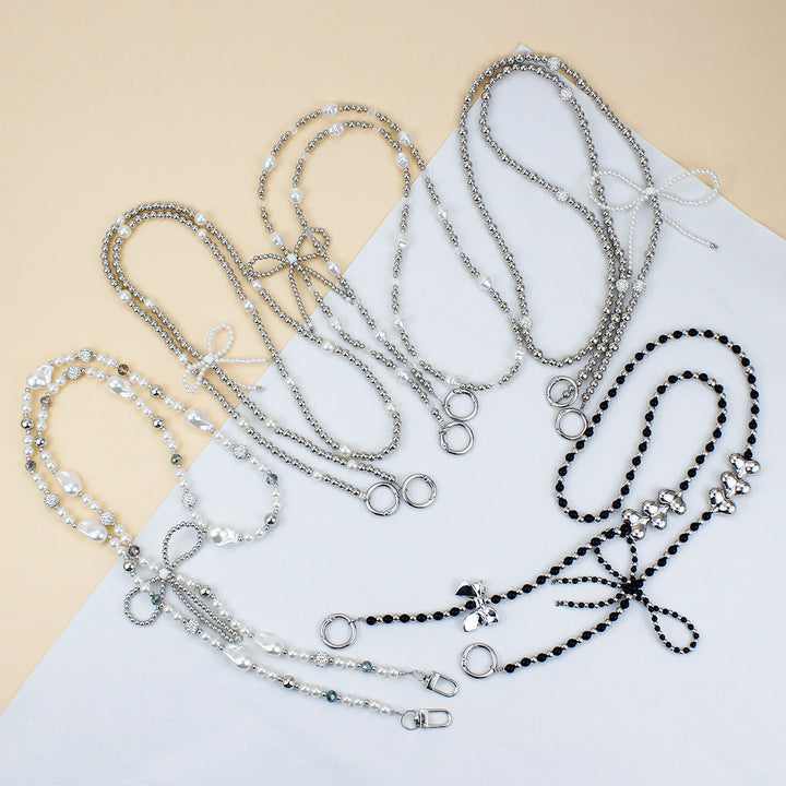 Elegant Pearl and Silver Necklace Bowlift